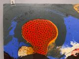 une photo d'un tableau accroché au mur
