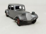a toy car that is sitting on a white surface