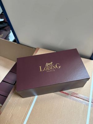 a box that is sitting on top of a cardboard box