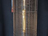 a metal container with a light inside of it on a table
