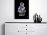 a white cabinet with a vase on top of it next to a black wall