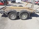 a trailer that is parked in a parking lot