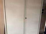 an image of a closet in a kitchen with tile flooring