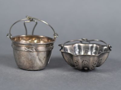pair of silver plated bowls and a silver plated bowl