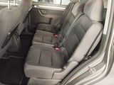 the back seats of a car are empty and the passenger seats are empty