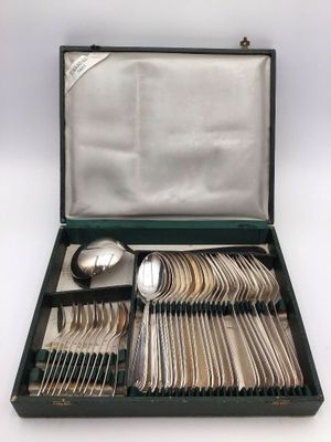 silver plated flatware set in a black case with silverware