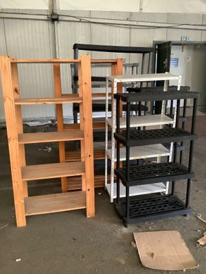 several shelves and shelves in a warehouse with a cardboard box