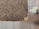 a close up of a piece of wood with a piece of wood sticking out of it