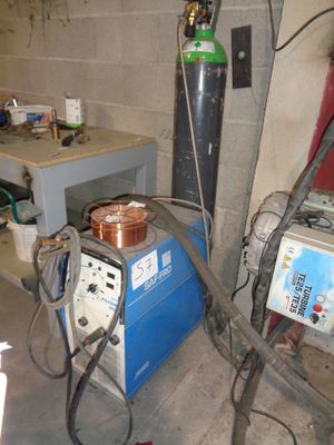 a machine that is sitting in a room with a lot of wires
