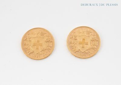 deux pièces d'or sur lesquelles est représenté un château