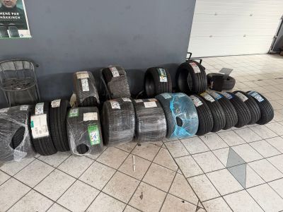 a lot of tires that are on the floor