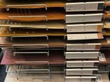 many stacks of folders stacked on top of each other