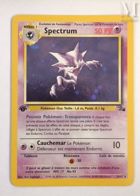 a close up of a pokemon card on a white surface