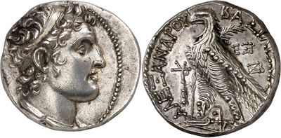 a silver coin with an image of a woman and a bird on it