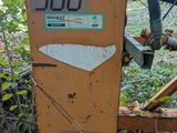 a small machine that is sitting in the woods