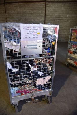 a metal cart with a bunch of items in it