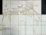 a picture of a map on the wall of a bathroom