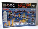 a box with a bunch of construction toys in it