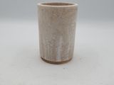 a small cup that is sitting on a table