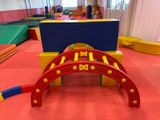 a colorful play area in the middle of the room