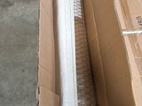 a cardboard box that has a mattress inside of it