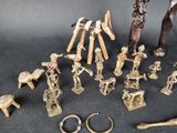 a lot of figurines that are sitting on a table