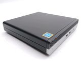 an image of a black laptop computer sitting on top of a white surface