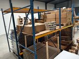 many boxes on the shelves in the warehouse
