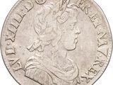a close up of a coin on a white background