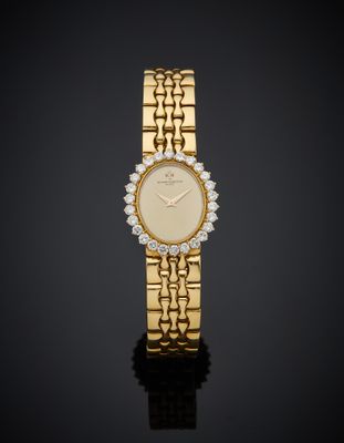 an 18k gold and diamond set wrist watch