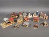 a lot of miniature houses that are sitting on a table