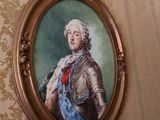 a picture of a painting of a man in armor on a wall