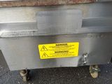 an image of a machine that is sitting on the ground