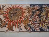 une photo d'un tapis orné d'un motif de tournesol