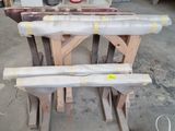 several pieces of wood are stacked on top of each other