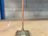 a floor lamp that is on top of a table