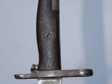 a close up of a knife on a table