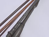 three wooden arrows that are on a white surface