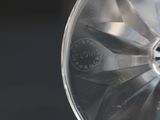 a close up view of a glass of water on a table
