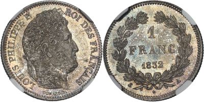 a close up of a coin on a white background