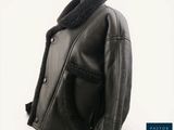 a black leather jacket with a black collar and a black jacket with a black collar and a black jacket with a black collar and a black jacket with a