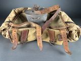 an image of a pair of old leather and canvas bags