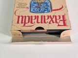 a box of pizza sitting on a table with the lid open