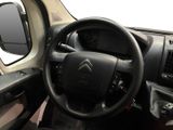 a steering wheel and dashboard of a small car