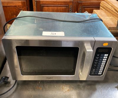 a microwave that is sitting on top of a counter