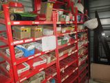 a red shelving with lots of items on top of it