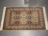 rug on the floor with a shadow of a person in the background