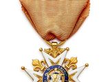 une médaille d'or surmontée d'une étoile