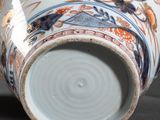 a close up of a vase with a design on it