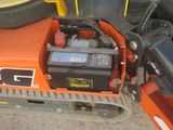 a picture of a tractor with a battery in the back of it